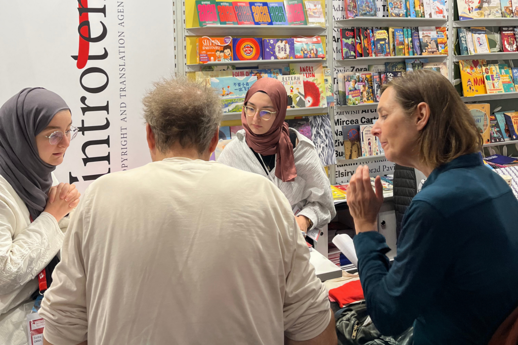 Introtema representative meeting international publishers during the Frankfurt Book Fair 2025.