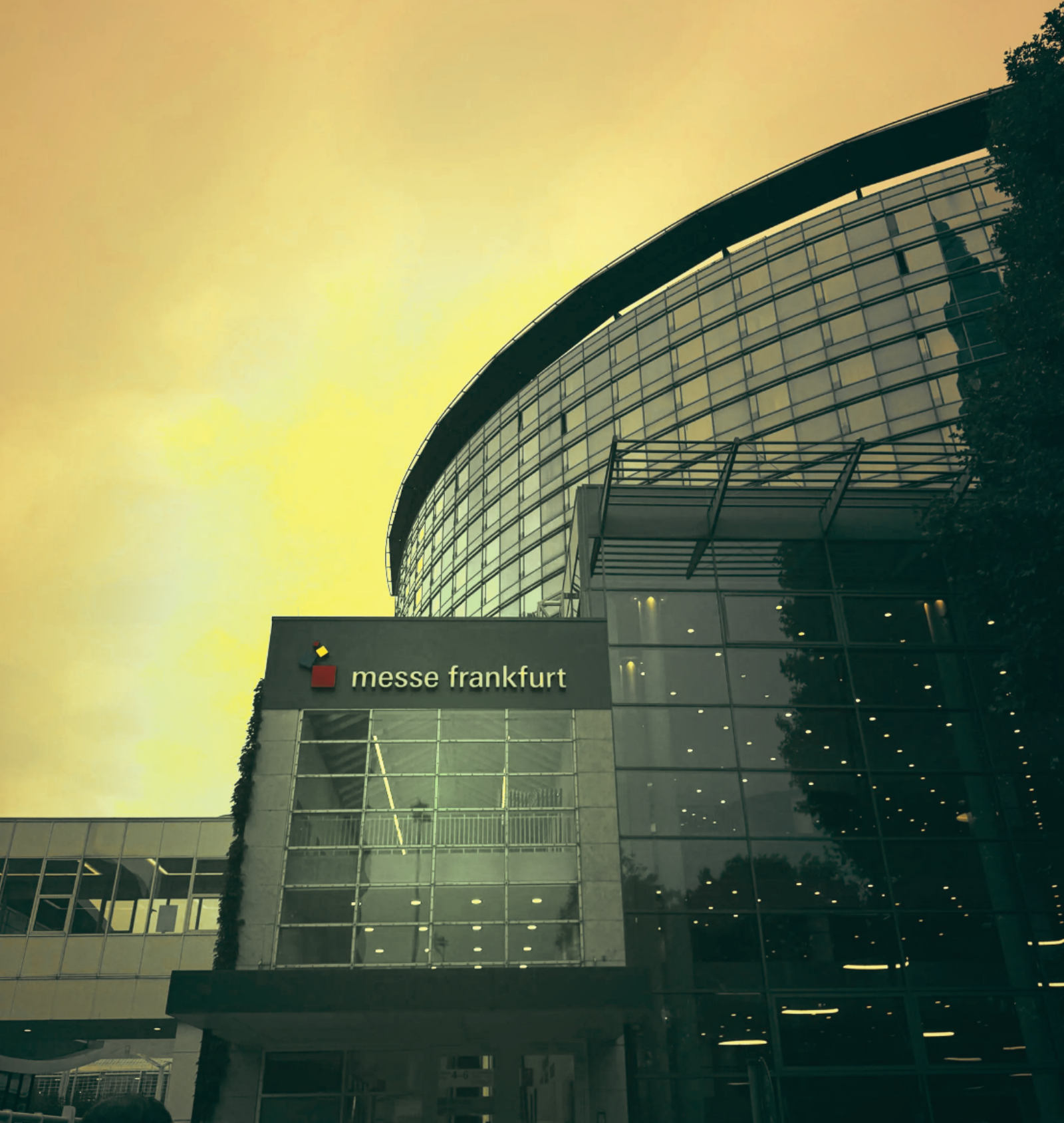 Entrance of the Frankfurt Book Fair 2025 with the official logo and clear sky.